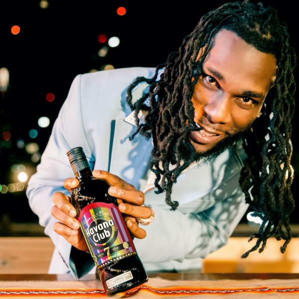 Burna Boy holding Havana Club Limited Edition bottle